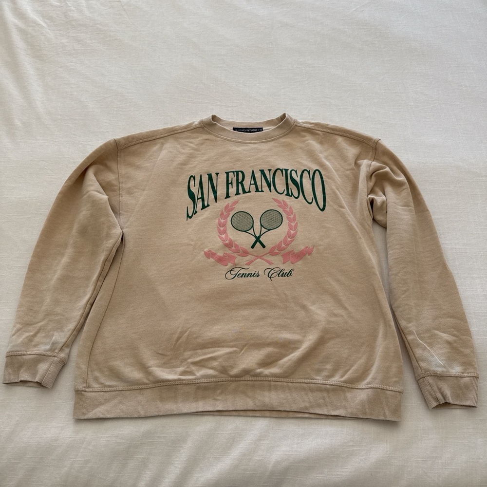 LULUSIMONSTUDIO SWEATSHIRT with tennis theme.
